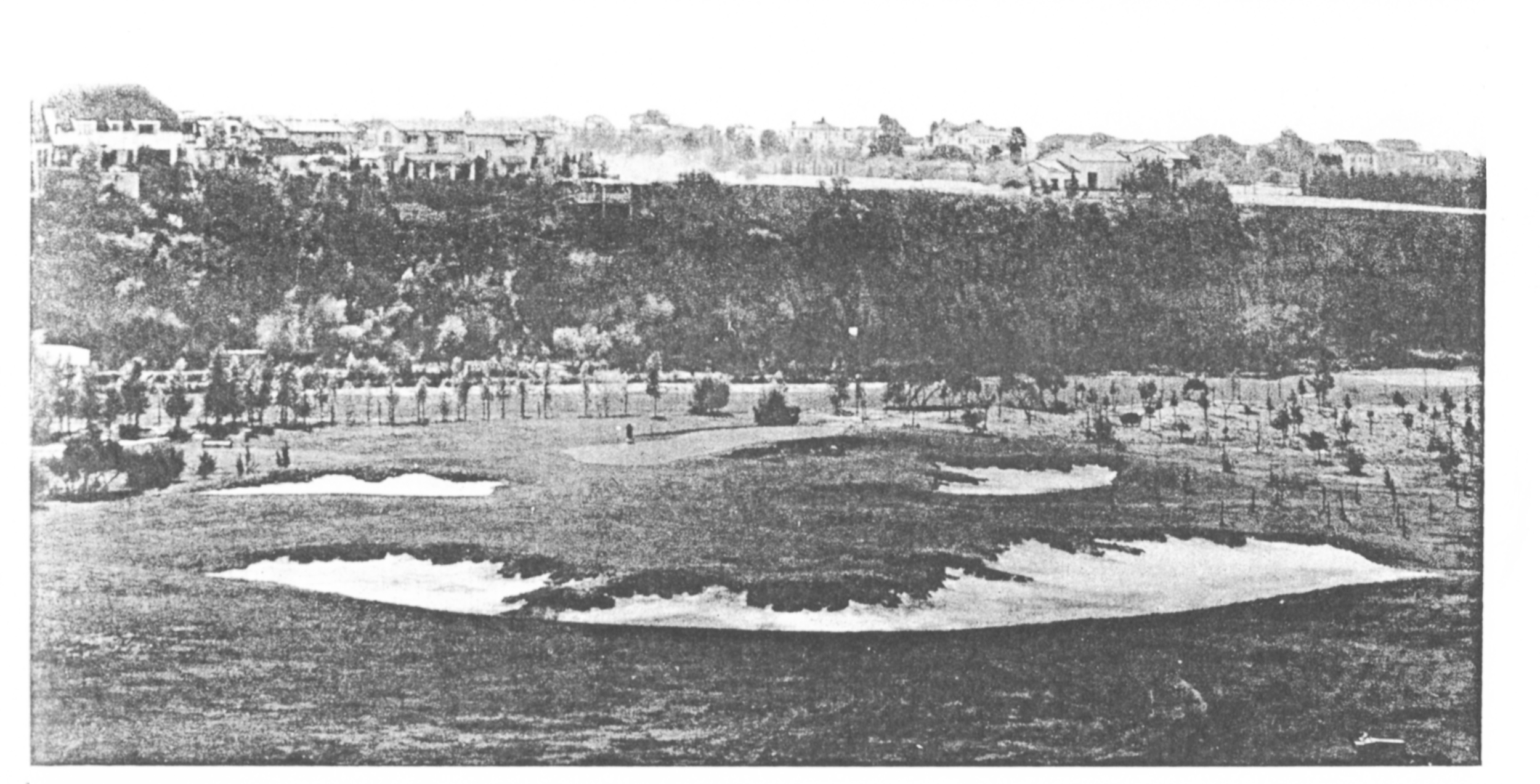 The 10th hole as bunkers are added around the green in 1928. The left “lay-up” bunker had also been recently installed. The two foreground bunkers and far right bunker were part of the original design.