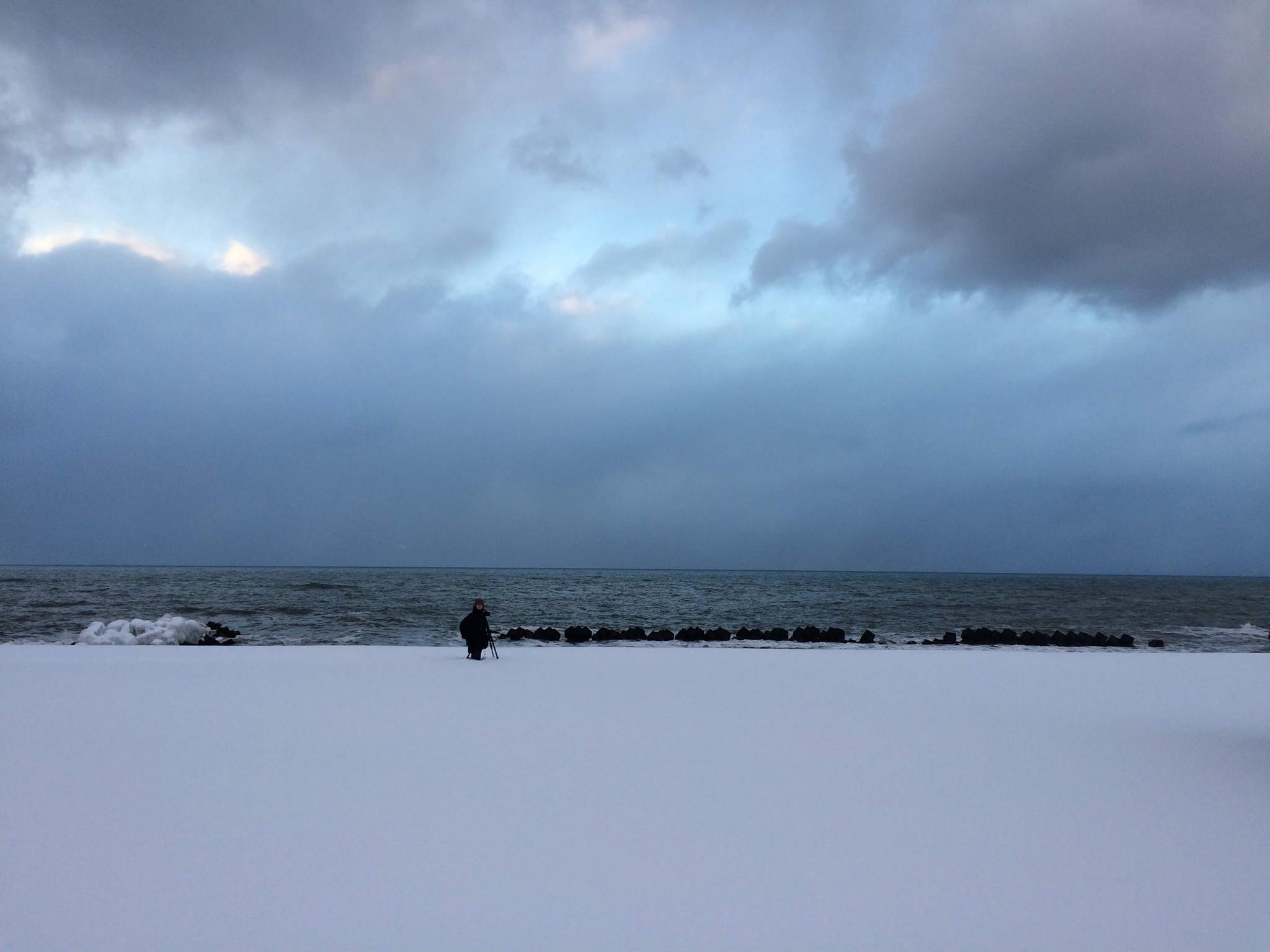 Thigh deep in snow trying to get a shot of the tetrapod sea defenses. By the time I realized how much effort this would be, I was in too far. (photo: Ulana Switucha)