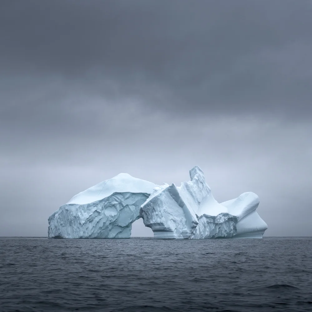 A sculpted iceberg in the North Atlantic A sculpted iceberg floating alone in the North Atlantic near Newfoundland