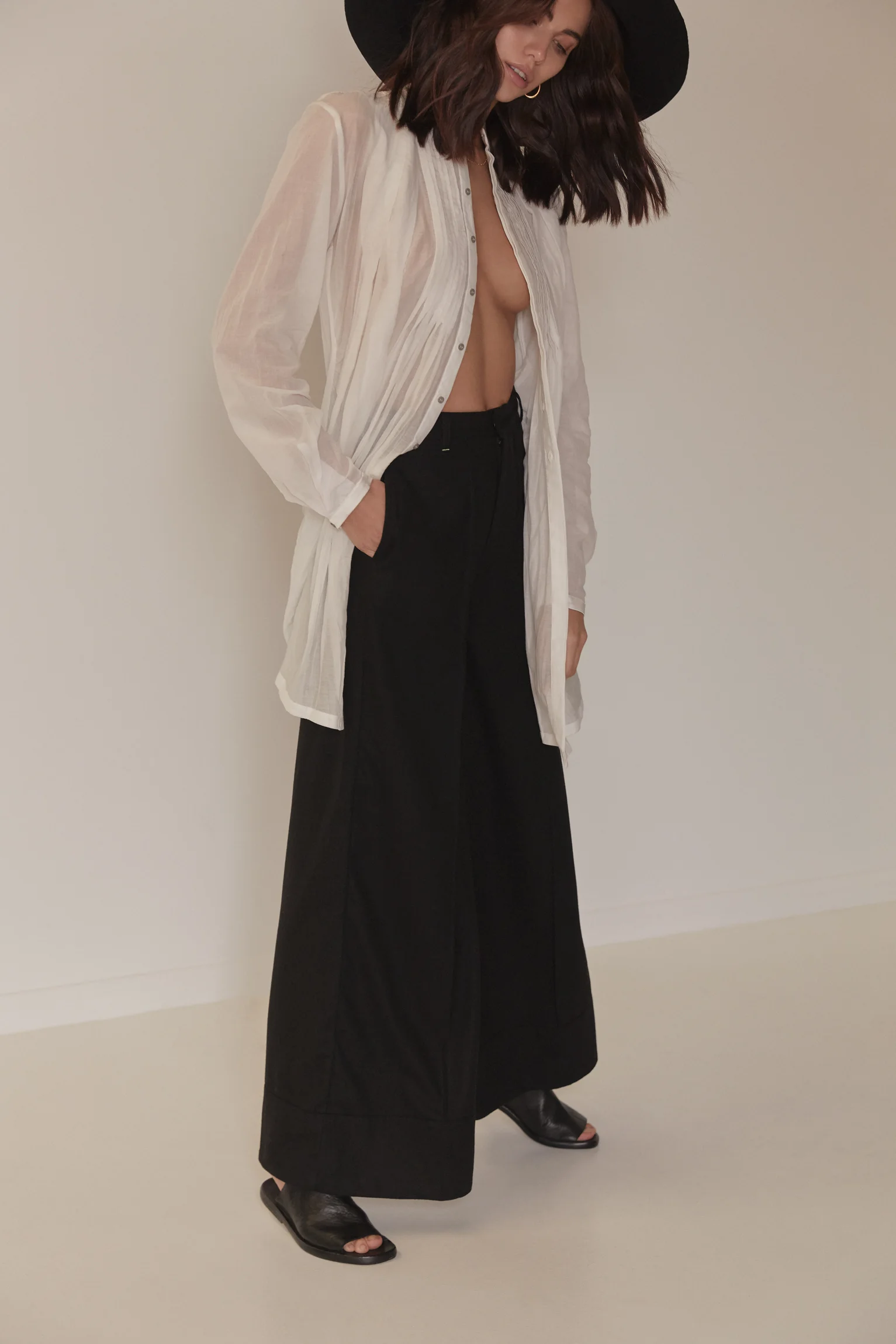 Shirt | Umitunal at Island Luxe , Trousers | Apres Studio , Hat | Horisaki Design & Handel at Island Luxe