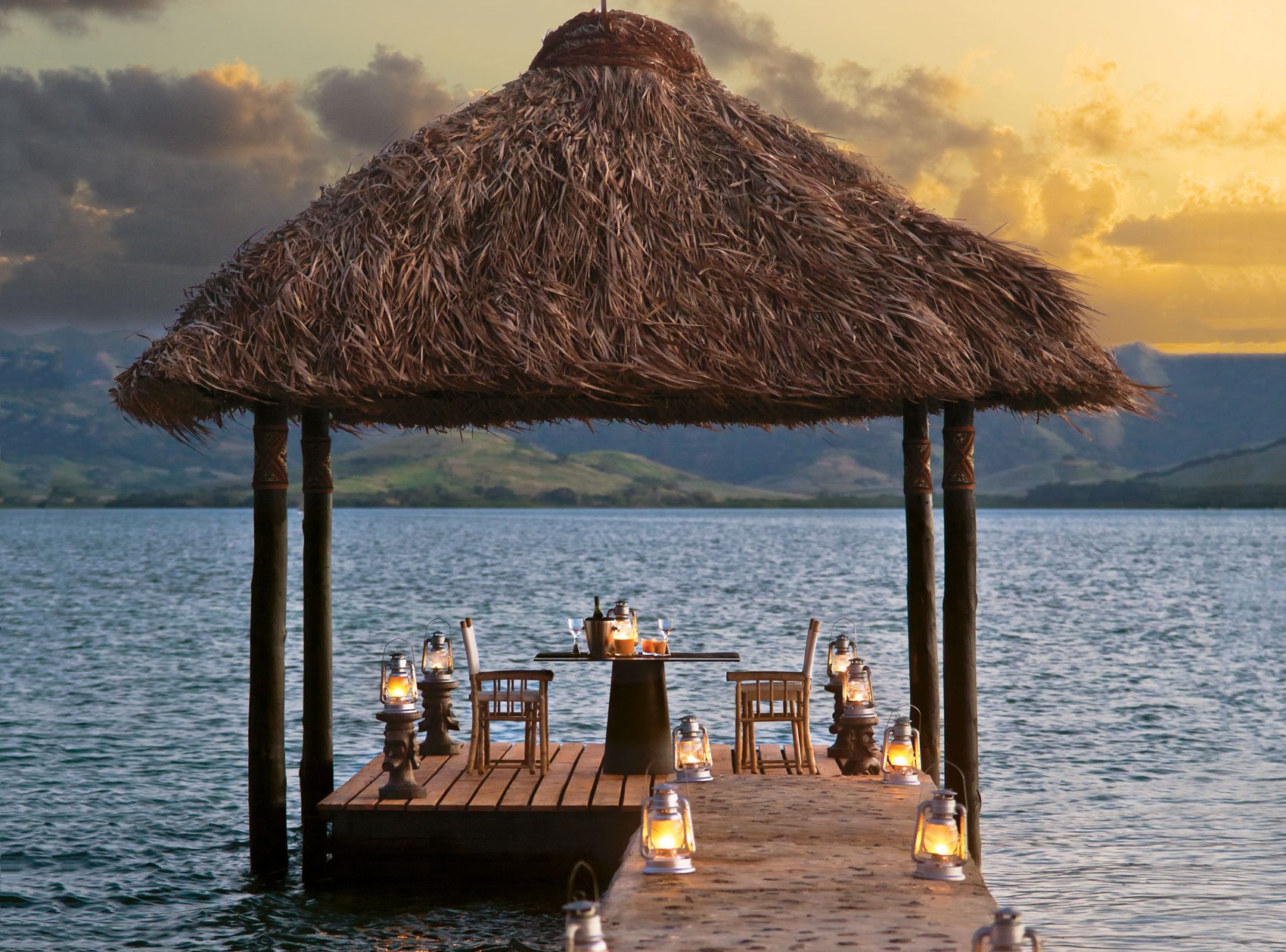 Lanterns-light-the-way-to-the-floating-pontoon-Dolphin-Island-Fiji-2139-edited.jpg