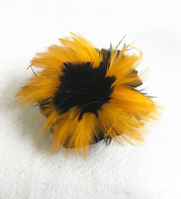 Bumblebee feather brooch