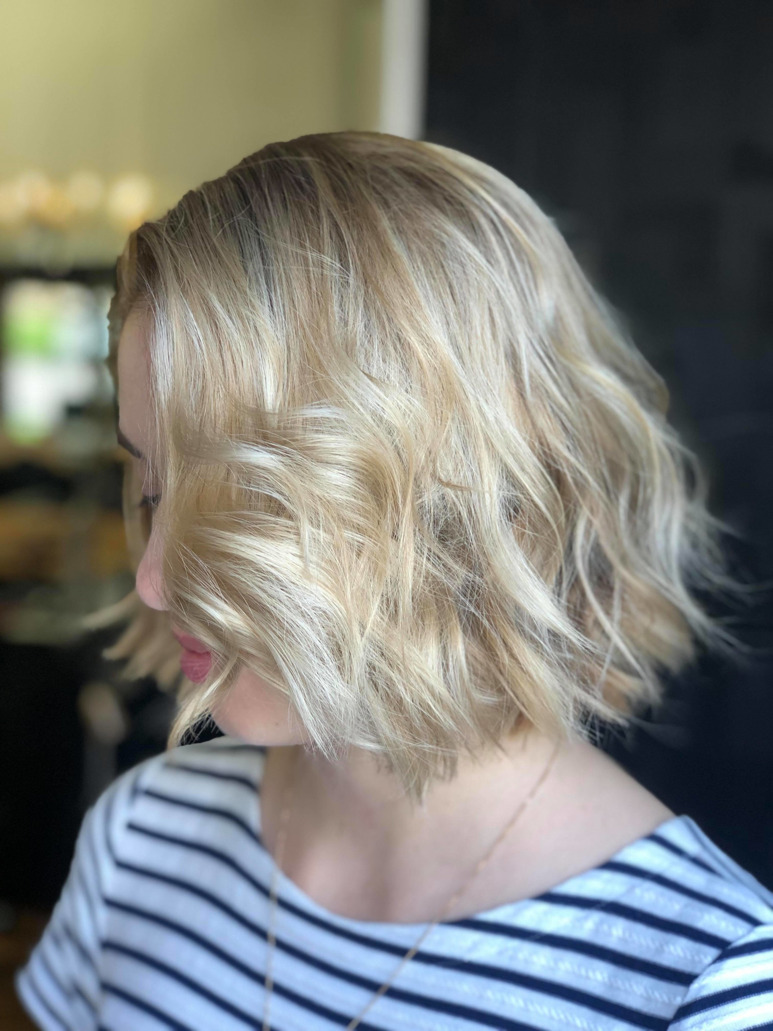  Photo of client with short, wavy blonde hair styled by Brady. Hair &amp; Beauty, Toowong, Brisbane. 