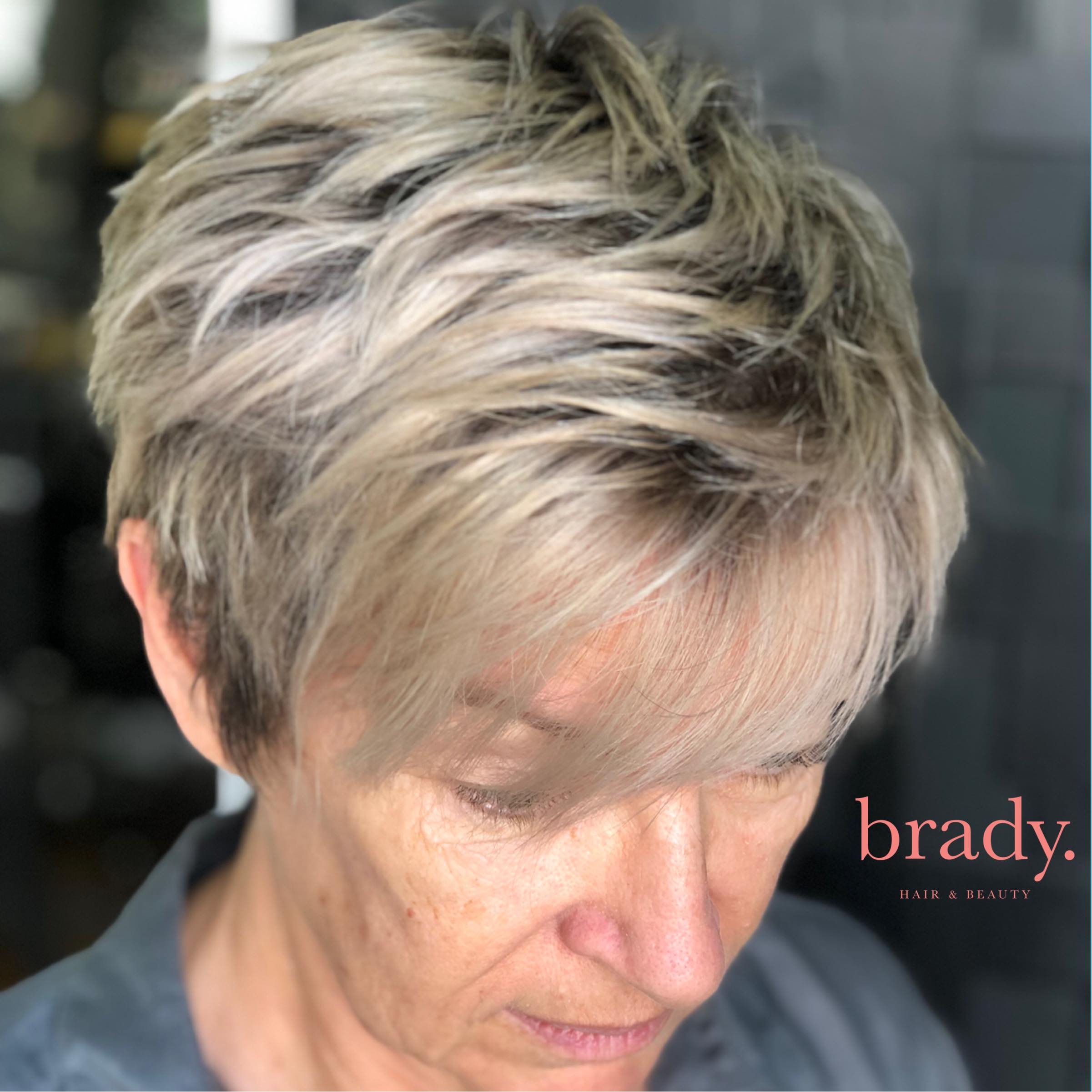  Photo of woman with short blonde hair. Styled by Brady. Hair &amp; Beauty, Toowong, Brisbane. 