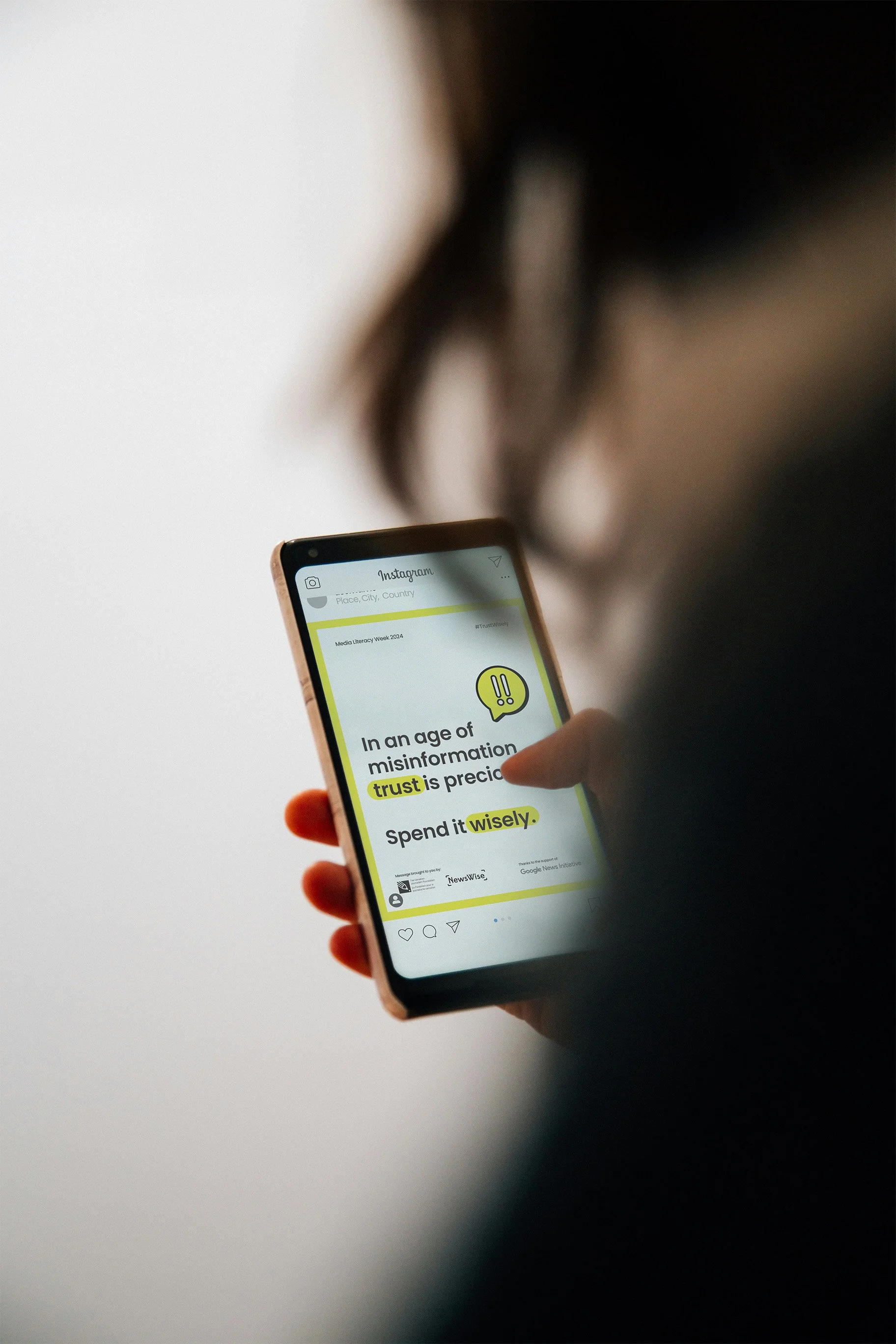 hand holding smartphone mockup.jpg