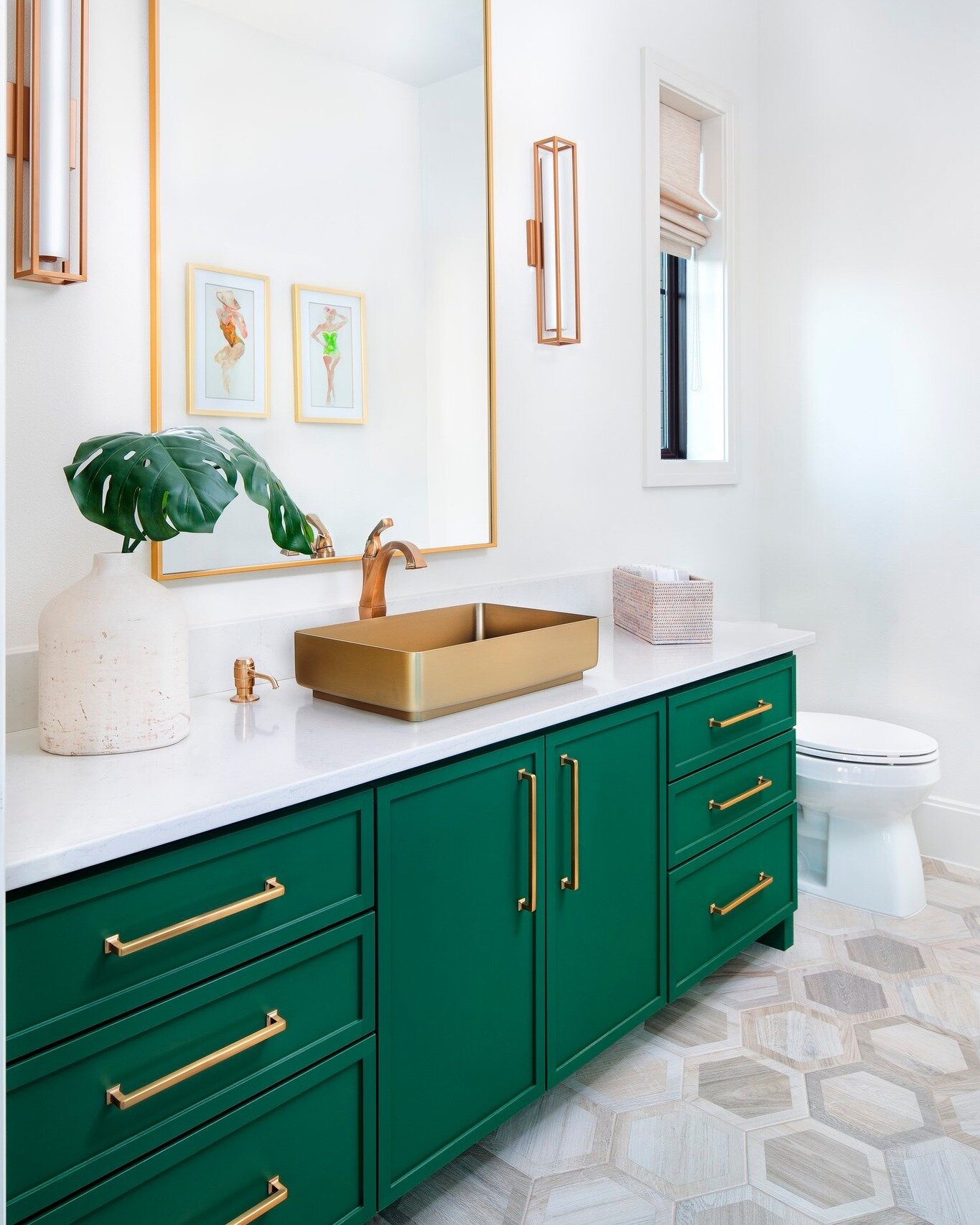 This poolside powder is the perfect tropical escape. We love our bold green vanity. The hexagon porcelain tile has the natural warmth of wood but the benefit of being maintenance free.

#austininteriordesign #austininteriordesigner #austindesign #atx