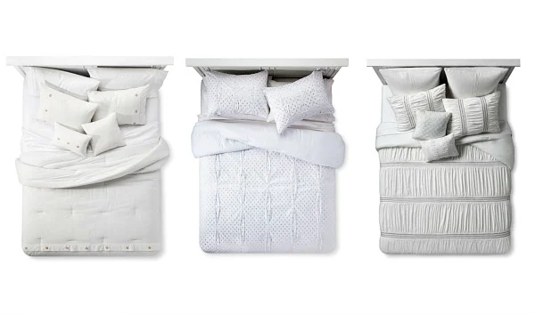 From right to left: Odette 8pc. Comforter Set, $79.99 ; Xhiliration White Gold Comforter Set , $49.99, White Bailey Cotton Seersucker 5pc Comforter Set, $99.99