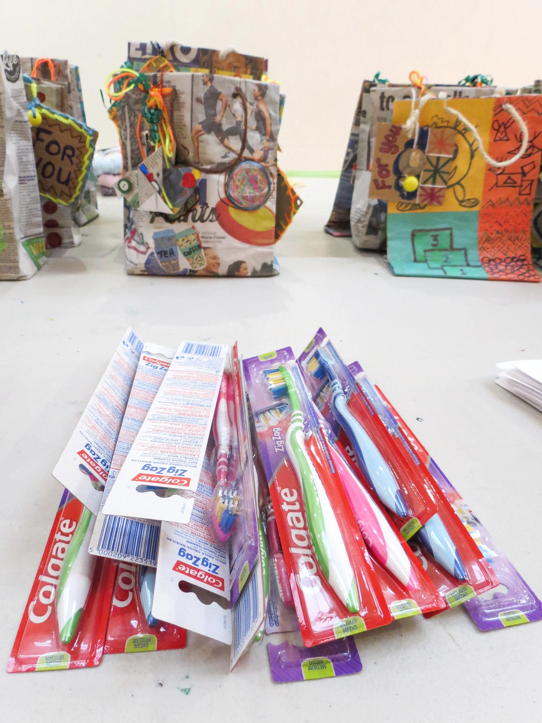 Positive Collective: Newspaper bags & gifts for local winter crisis centre