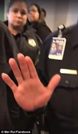 视频截图：芮美与工作人员理论