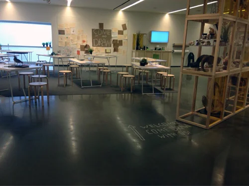 the space in november 2017, with my initial attempts at invitations (tape on the floor + the sign)