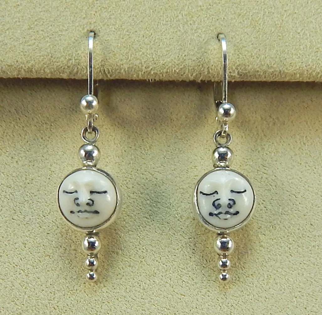 148%2C+Carved+Bone+Face+Earrings.jpg