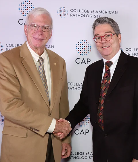 Terry receives the College of American Pathologists’ 2017 Excellence in Education Award from President Bruce Williams, October 2017.