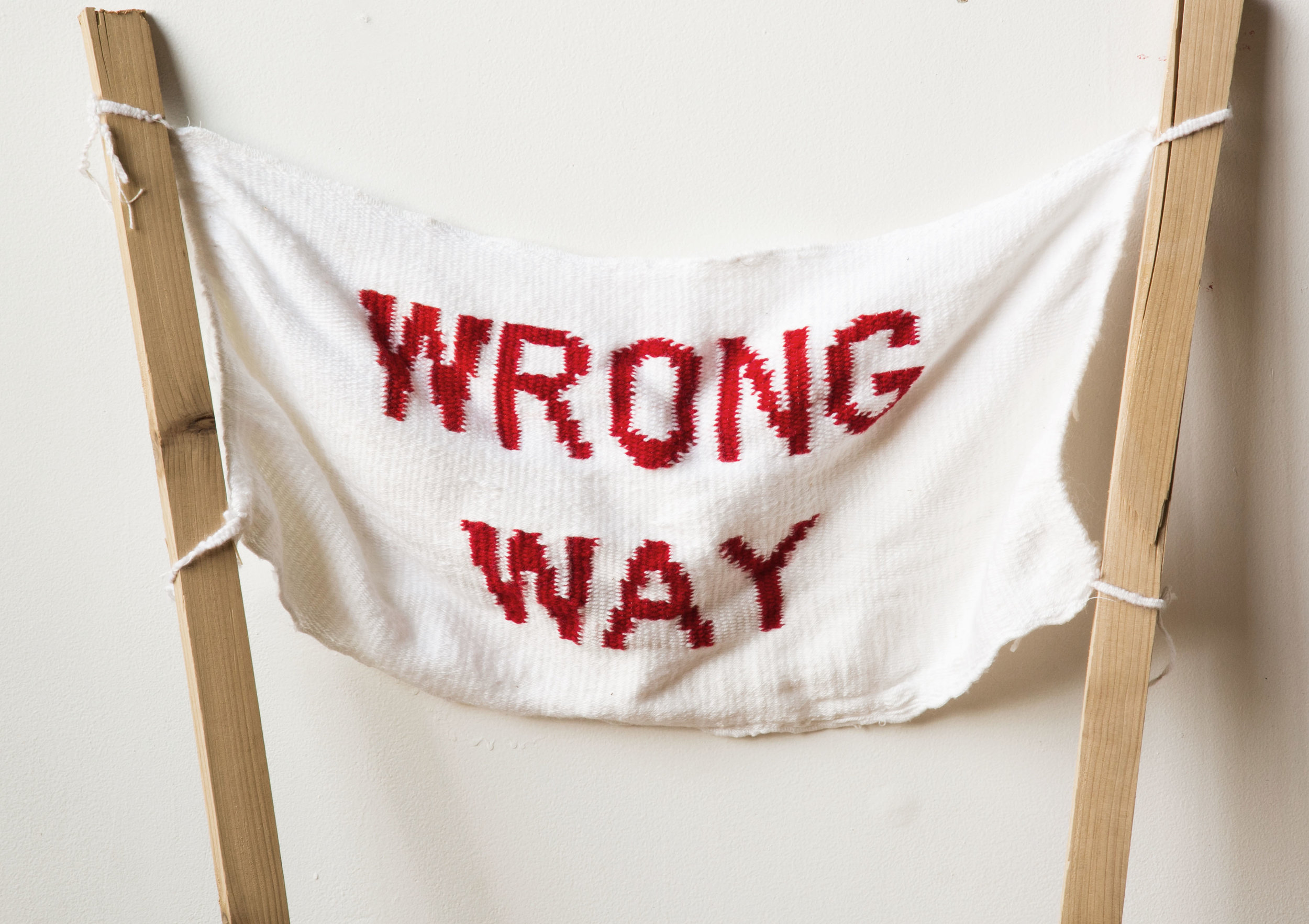   wrong way  detail  handwoven sign + site specific installation documentation  2018 