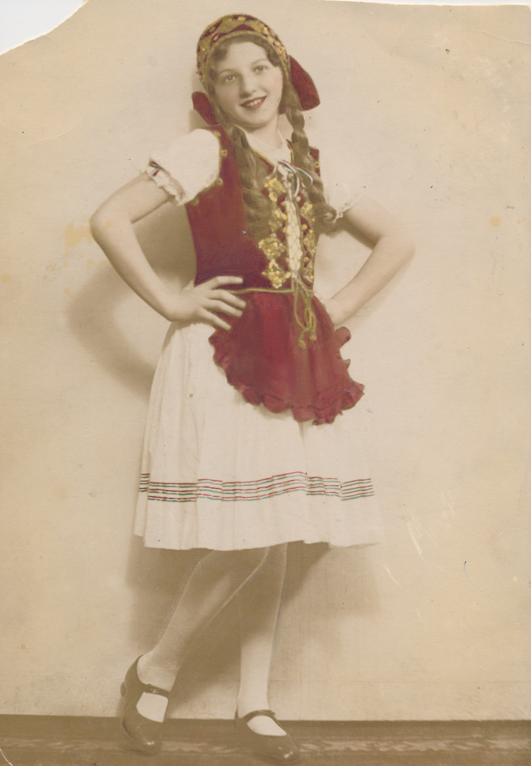  Veronica as a teenager in Budapest wearing one of the traditional Hungarian "peasant" dresses for a school dance.&nbsp; 