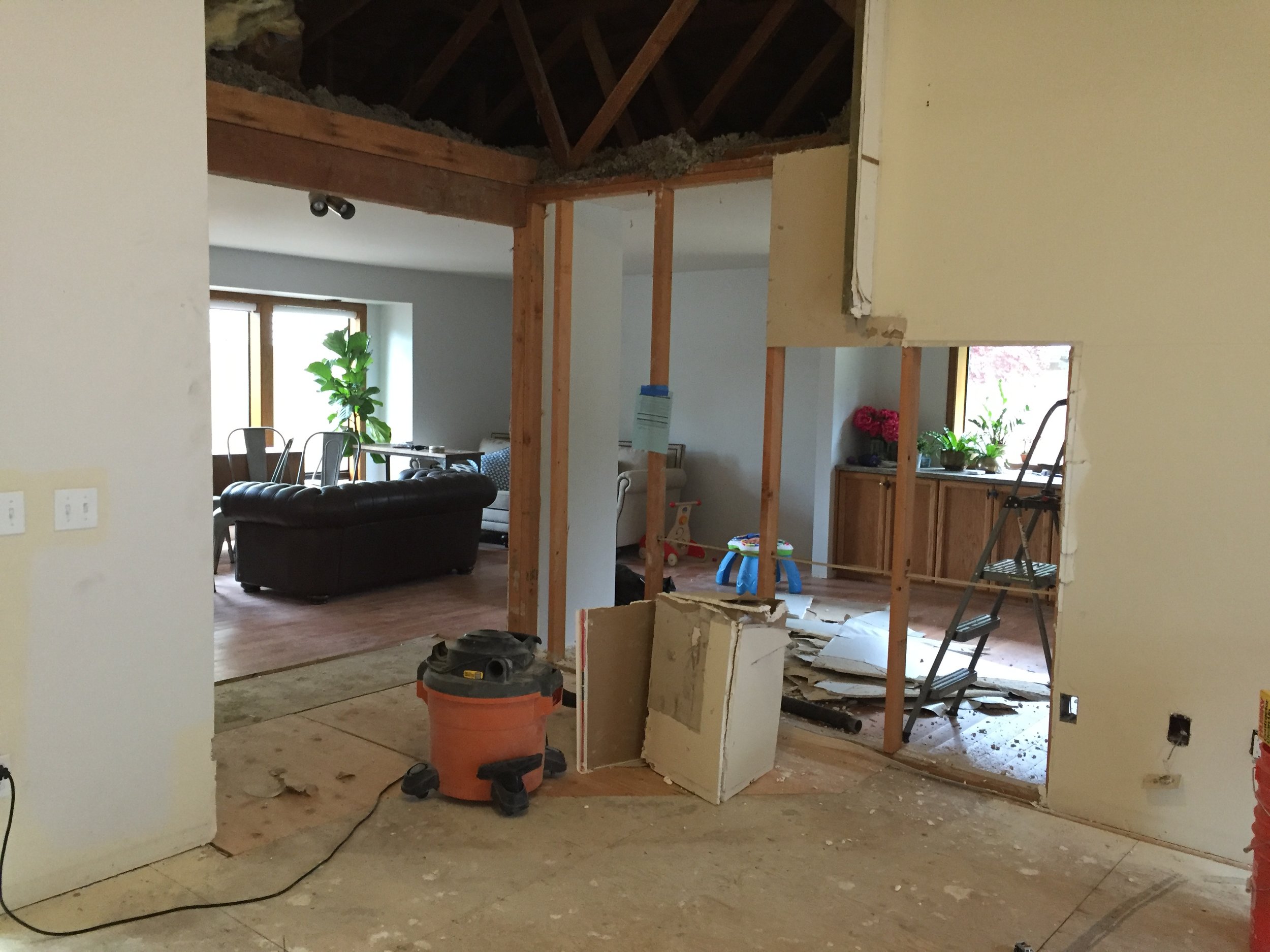 The day after the fireplace was out I started demo on the wall. While my son was sleeping and husband was at work, I went for it. I love demo! 