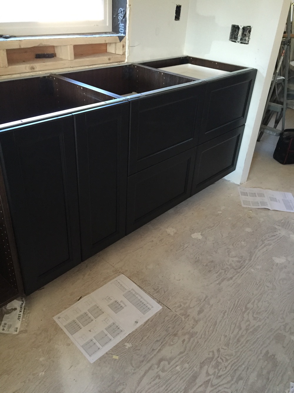Ikea Laxarby Black/Brown Cabinet. I love them! They are solid wood fronts. 