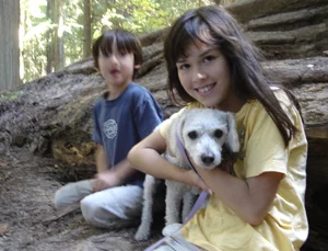Maya and Gabriel with Misha on his way home from being adopted. July 2008.