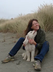 Misha with his person. Mad River Beach, Arcata, California, November 2012.