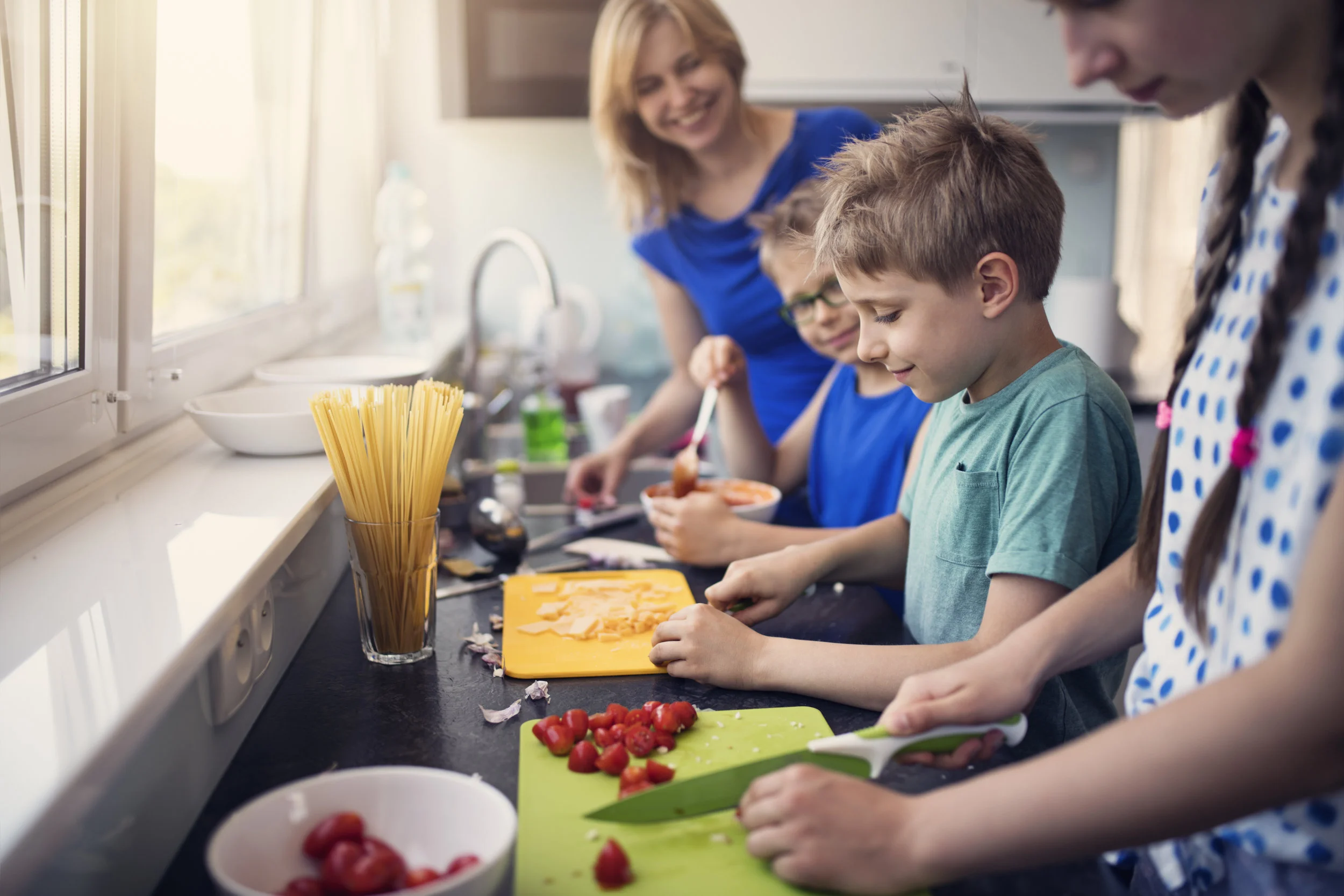 iStock-971346934 Kids Making Lunch.jpg