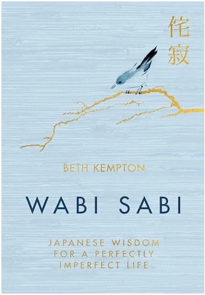 Wabi Sabi book cover by Beth Kempton, pale blue with an illustration of a bird on a branch and Japanese characters, subtitled Japanese Wisdom for a Perfectly Imperfect Life