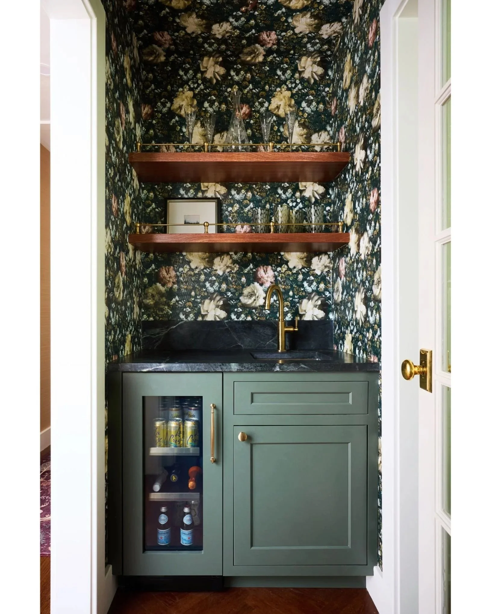 Bar niche with beverage cooler and wallpaper