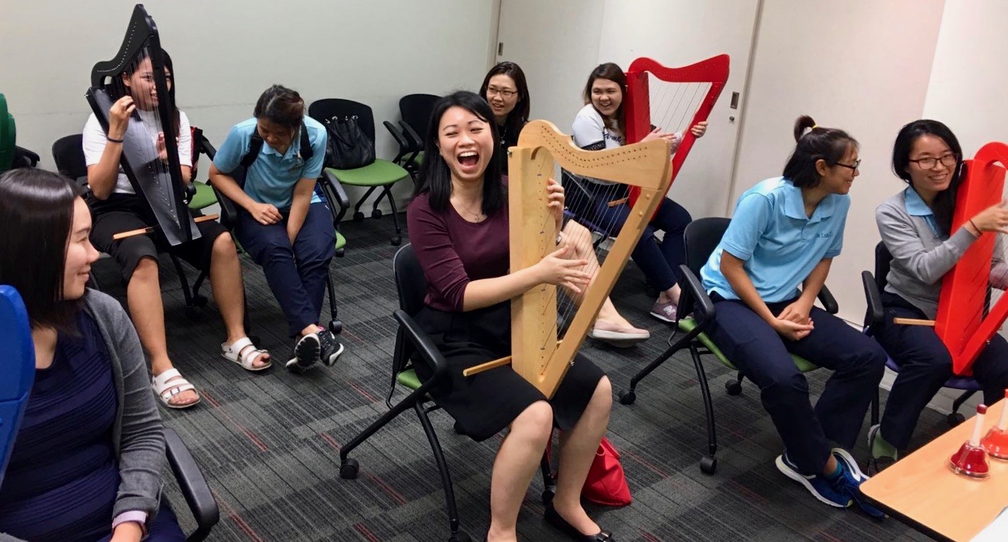 Beth Soh teaches harp at St. Luke's Hospital in Singapore.