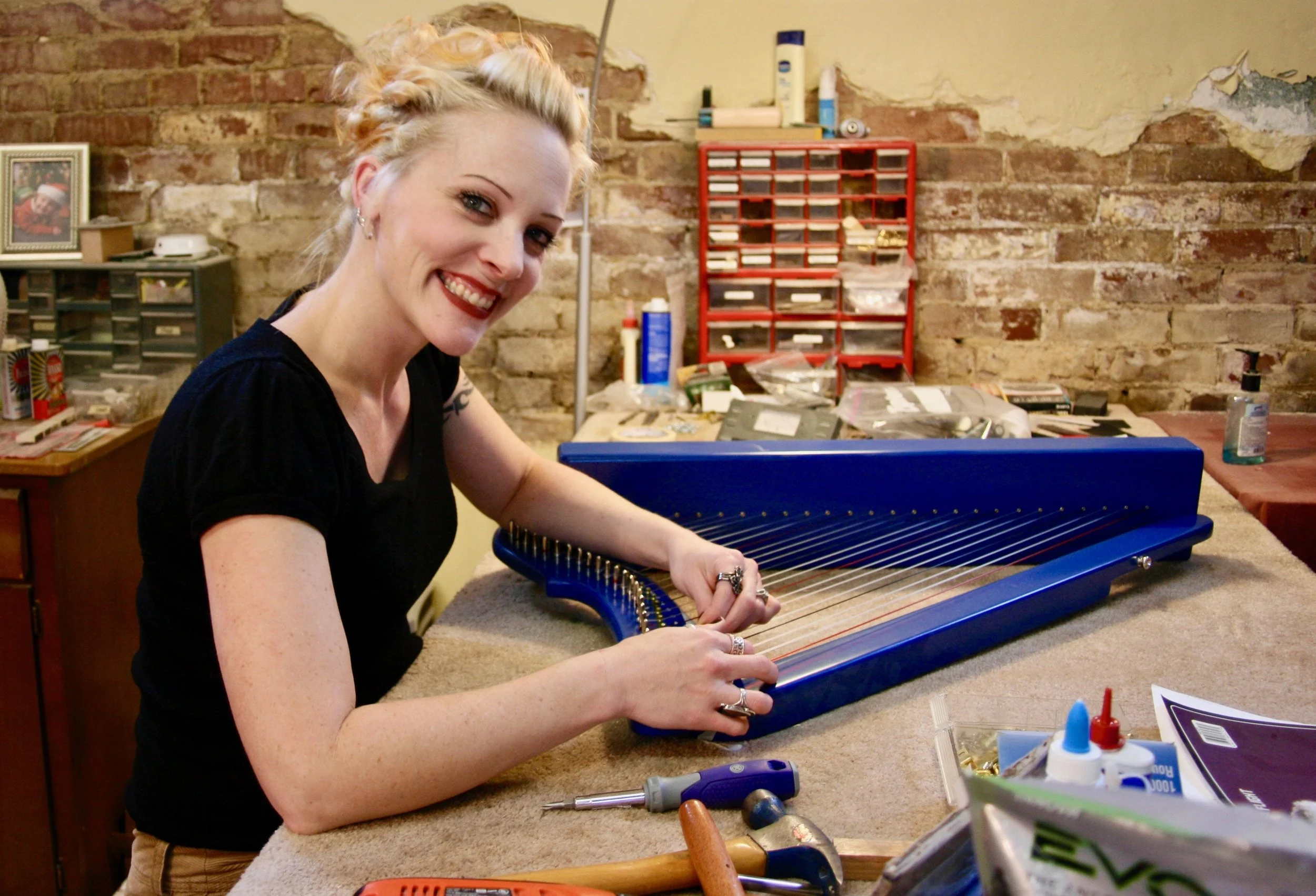 Rebecca Brown levering a Fullsicle™ Harp.
