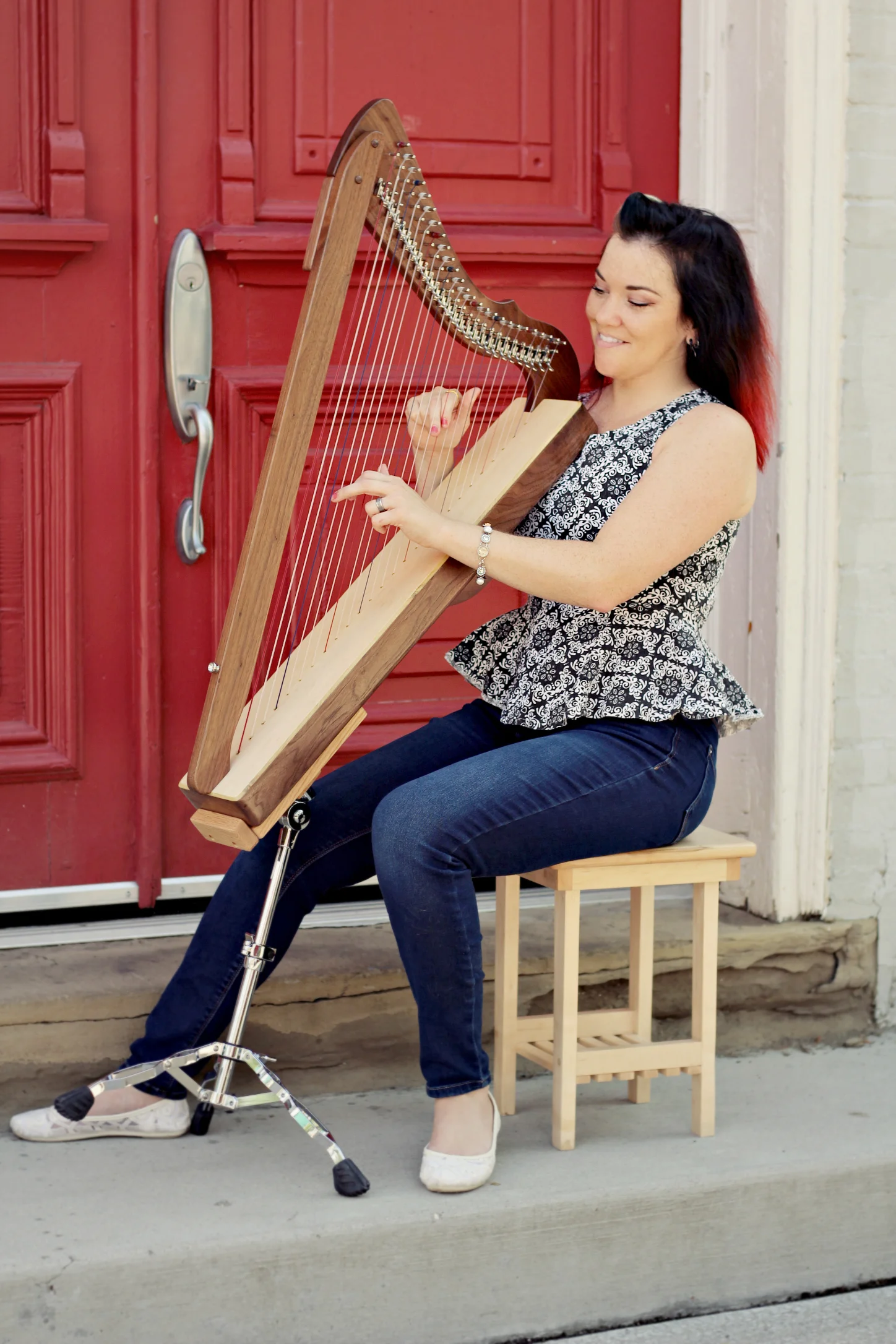 Melissa with a Special Edition Fullsicle™ Harp on an Adjustable Stand.