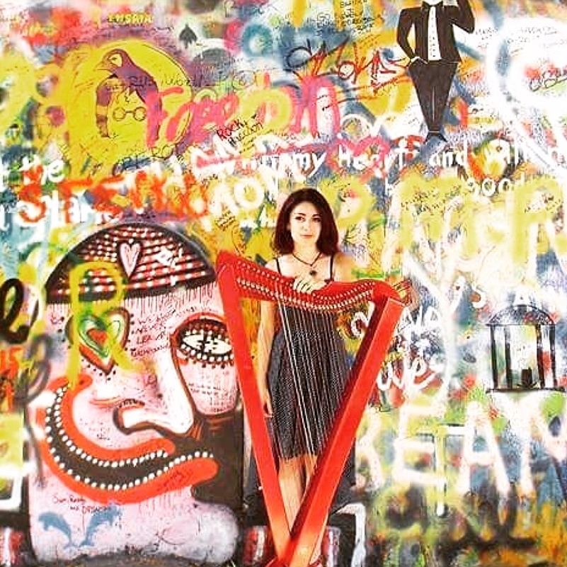 Carol Lopez Marin in Prague at the Lennon Wall