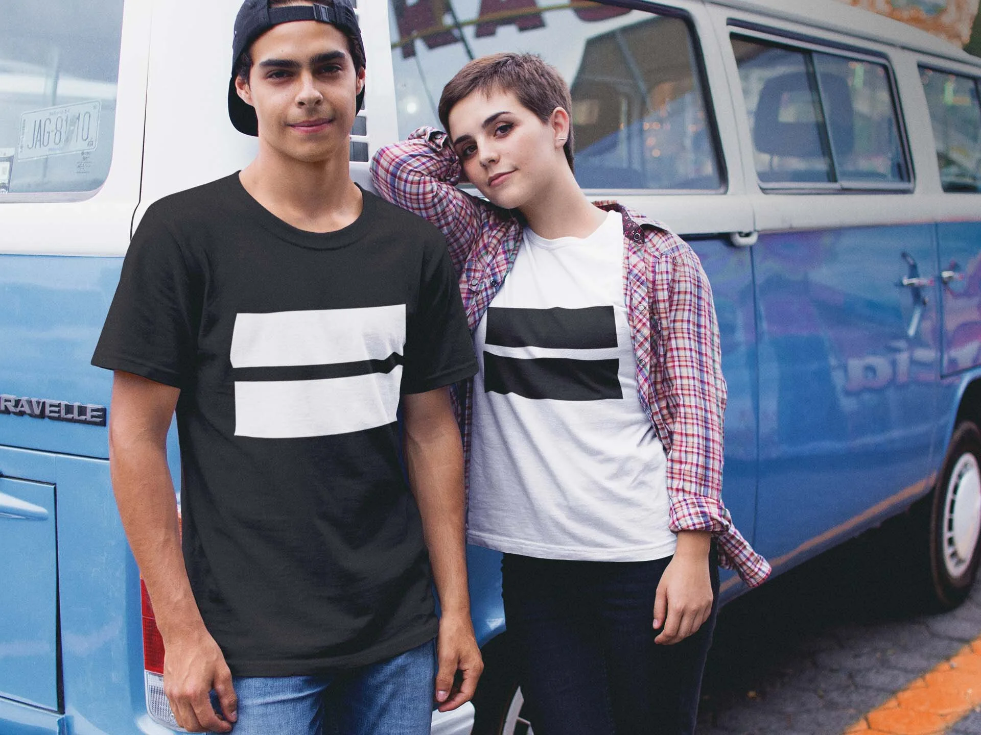 couple-wearing-different-round-neck-tees-mockup-against-a-blue-van-a16443.jpg