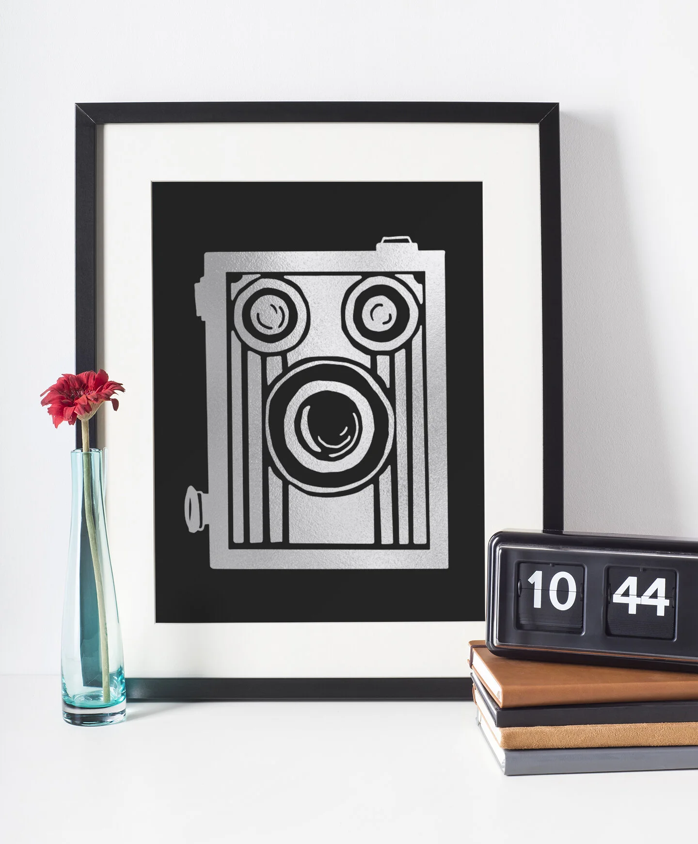 picture-frame-mockup-standing-next-to-a-flower-vase-and-a-retro-alarm-clock-603-el.jpg