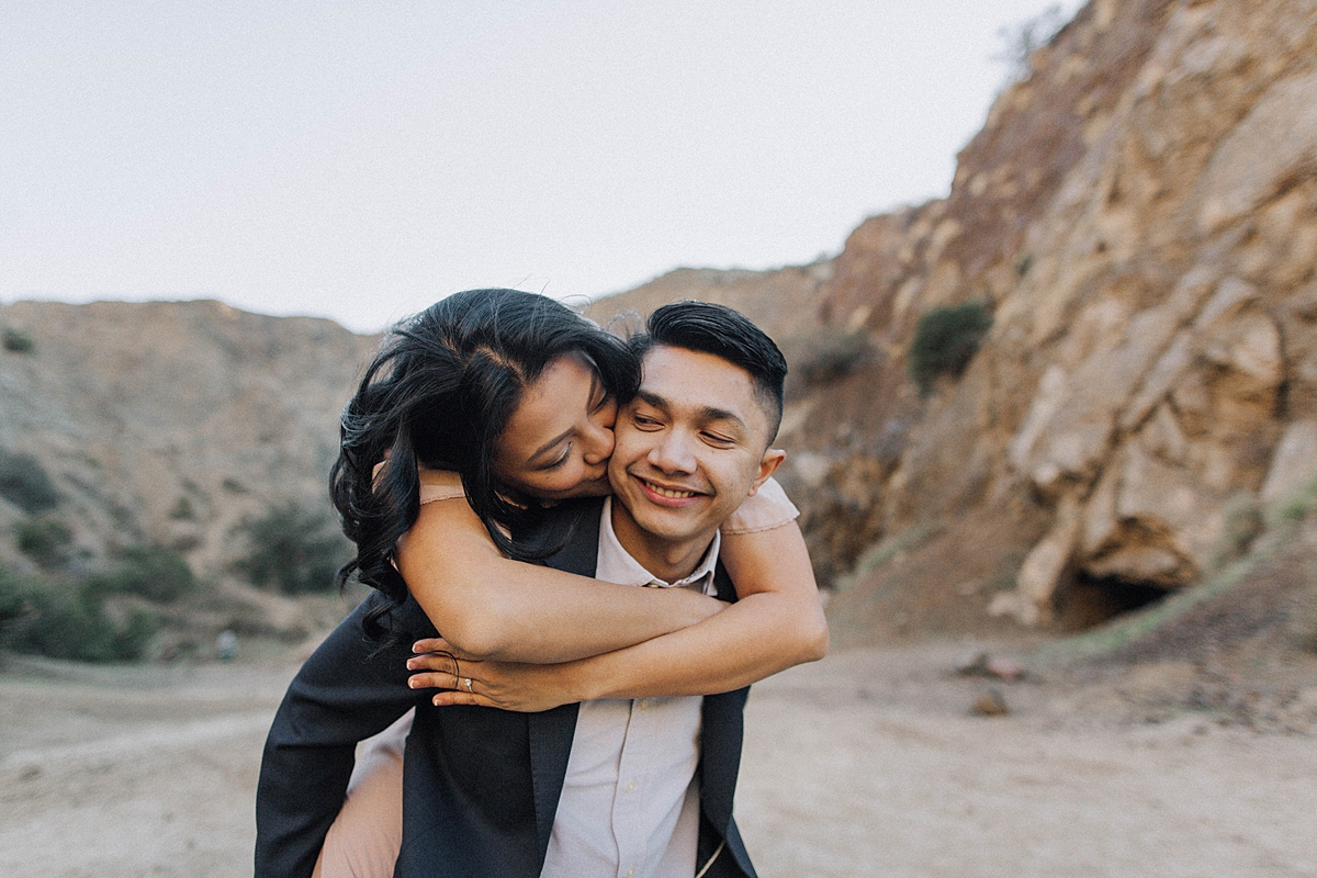 Los Angeles Romantic Outdoor Engagement Photos in the Mountains, piggyback ride engagement photos