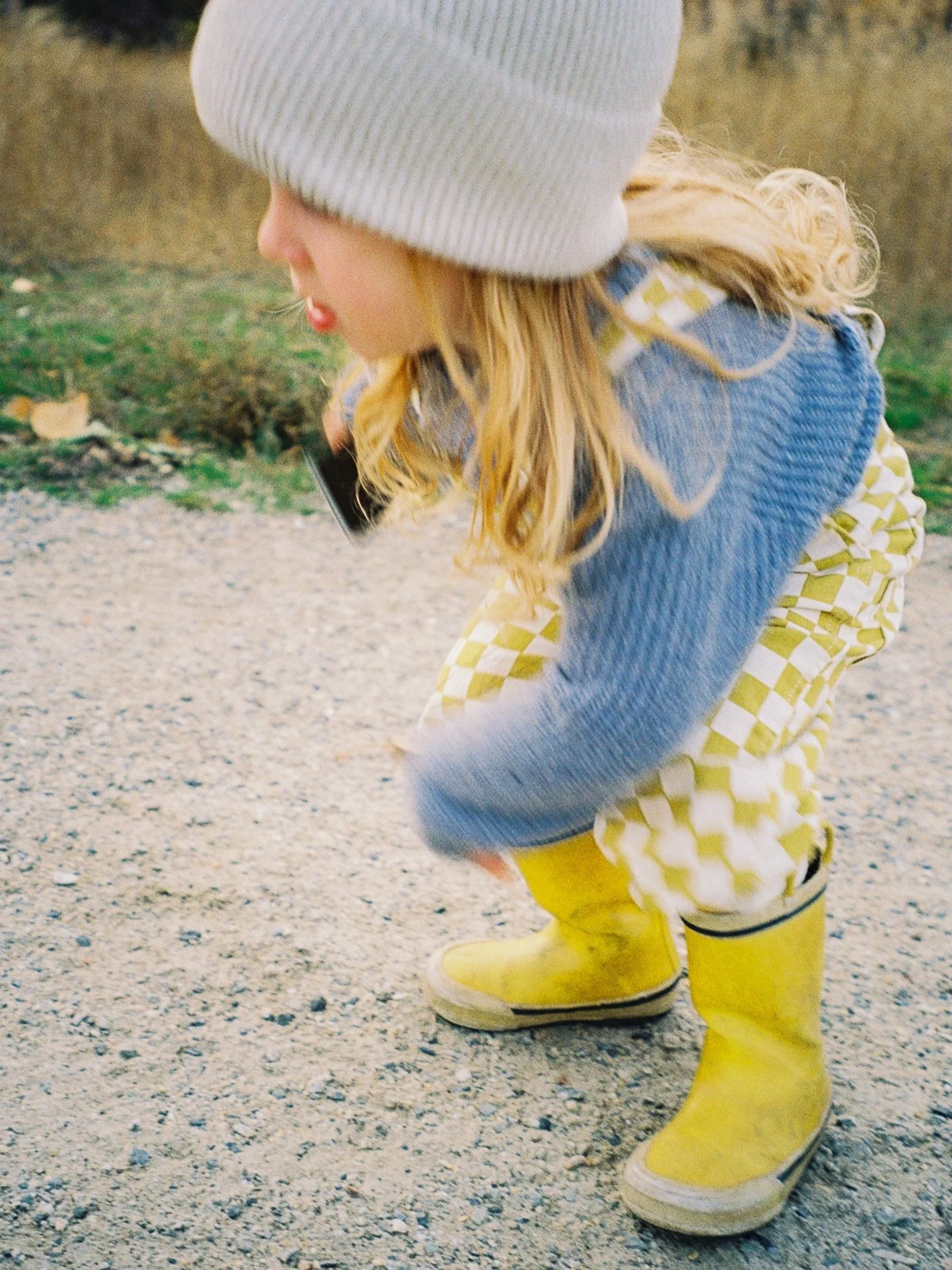 I&rsquo;ve been holding on to these film photos for months because I wanted to perfect a caption about his yellow rubber boots. How he stole them from his older brother over a year ago and basically hasn&rsquo;t taken off since. How he would wear the