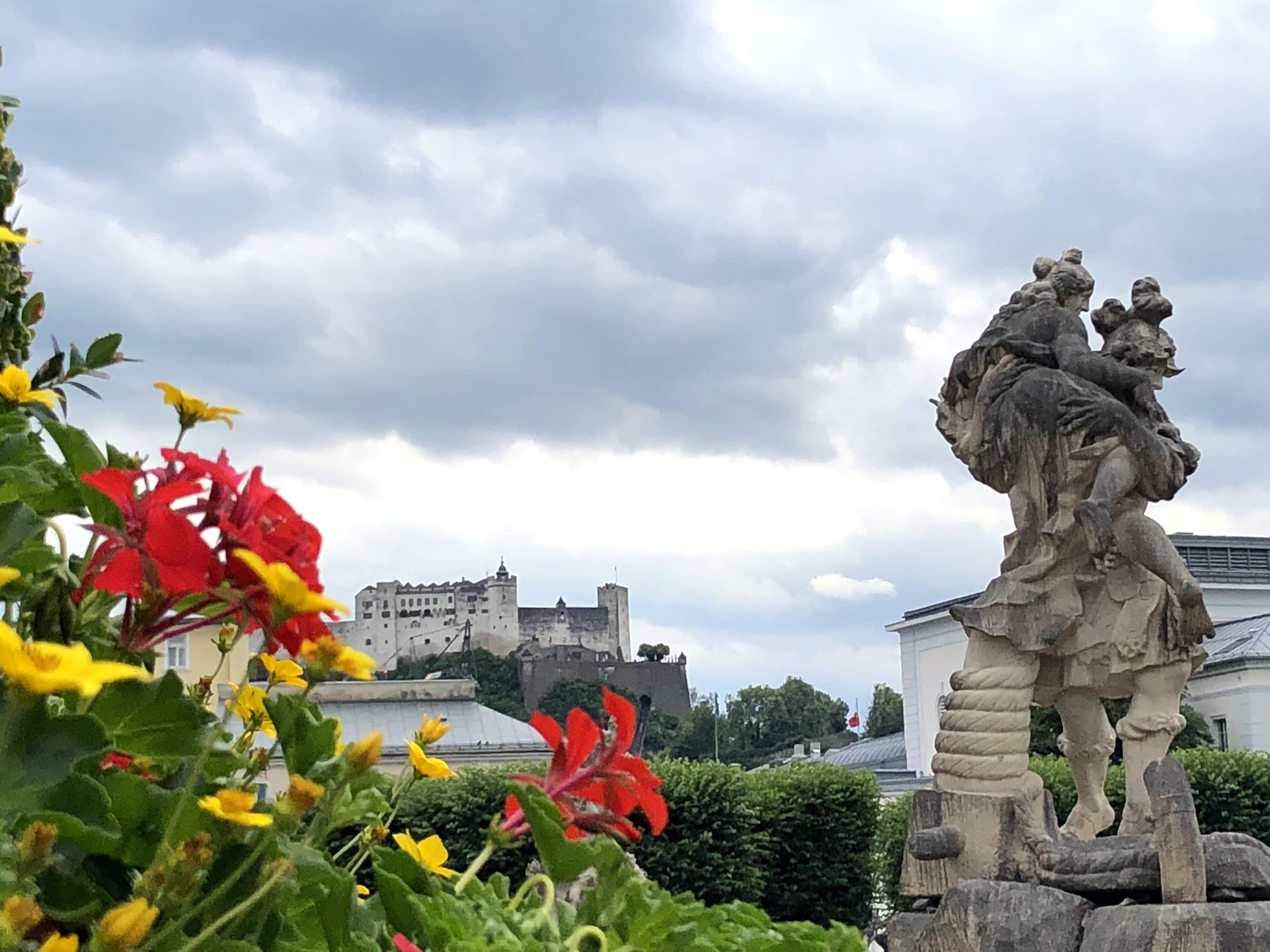 Flowers and statue in garden - Salzburg