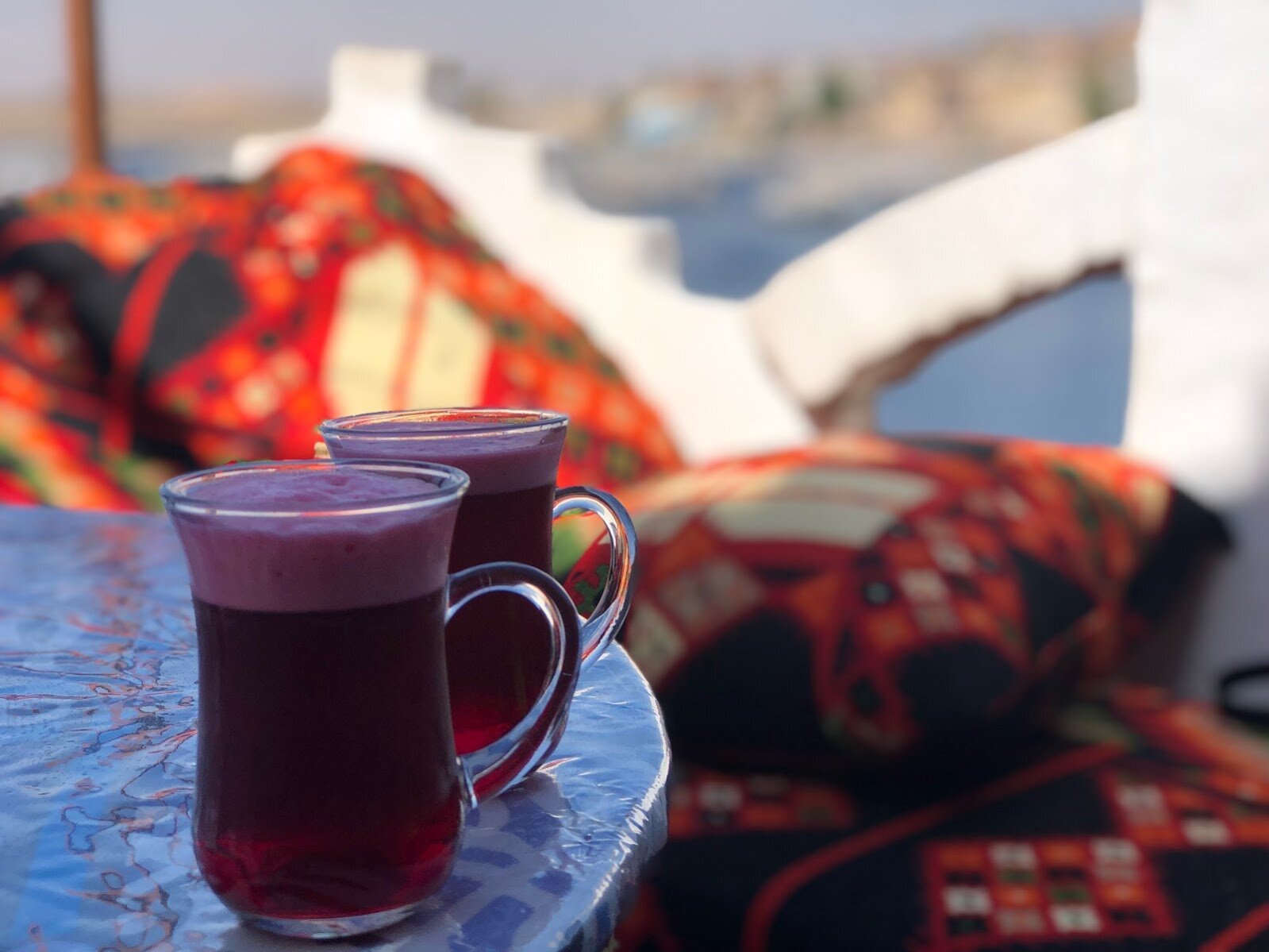 Two red drinks in a Nubian cafe.