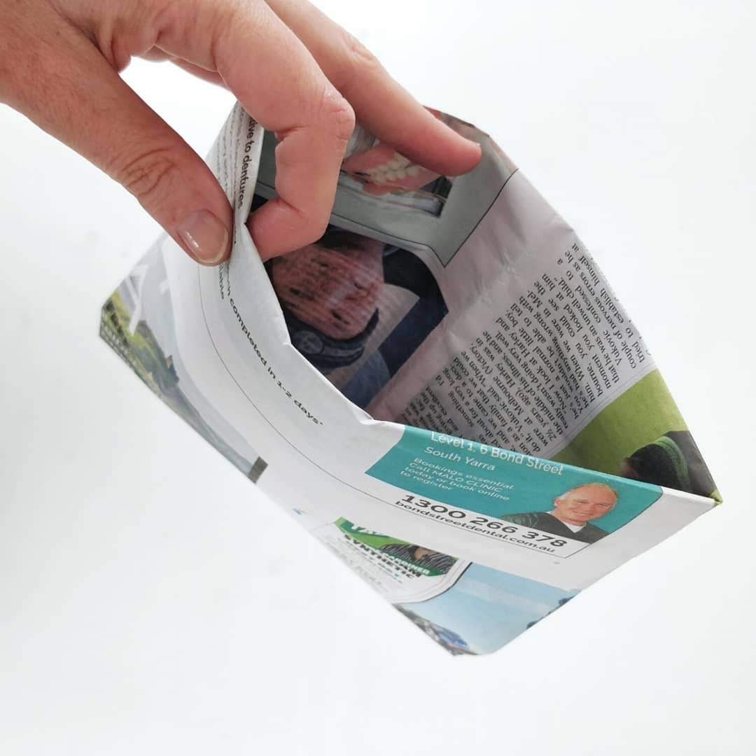 Newspaper dog poo bag how to Reusable Nation pg9.jpg