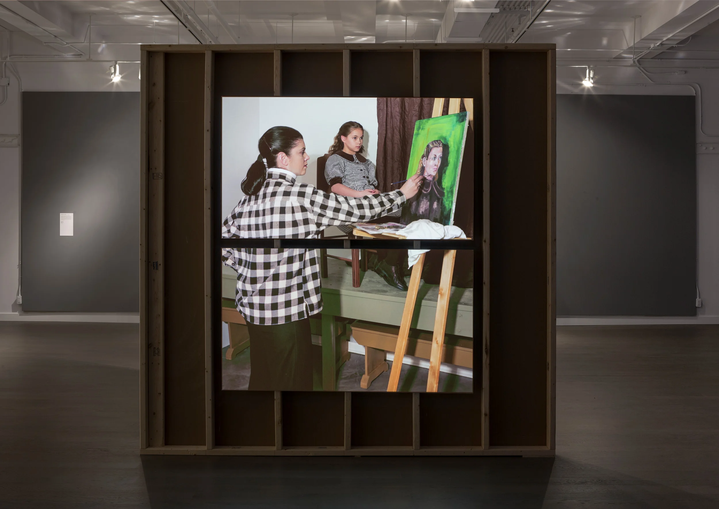 Three Generations (Kodiak Art Club, 1953) , 2014 Two HD video projections 5 min 54s (top) and 6 min 07s (bottom) Installation view at Koffler Gallery, Toronto. Produced with the assistance of the Koffler Gallery. Photograph by Toni Hafkenscheid