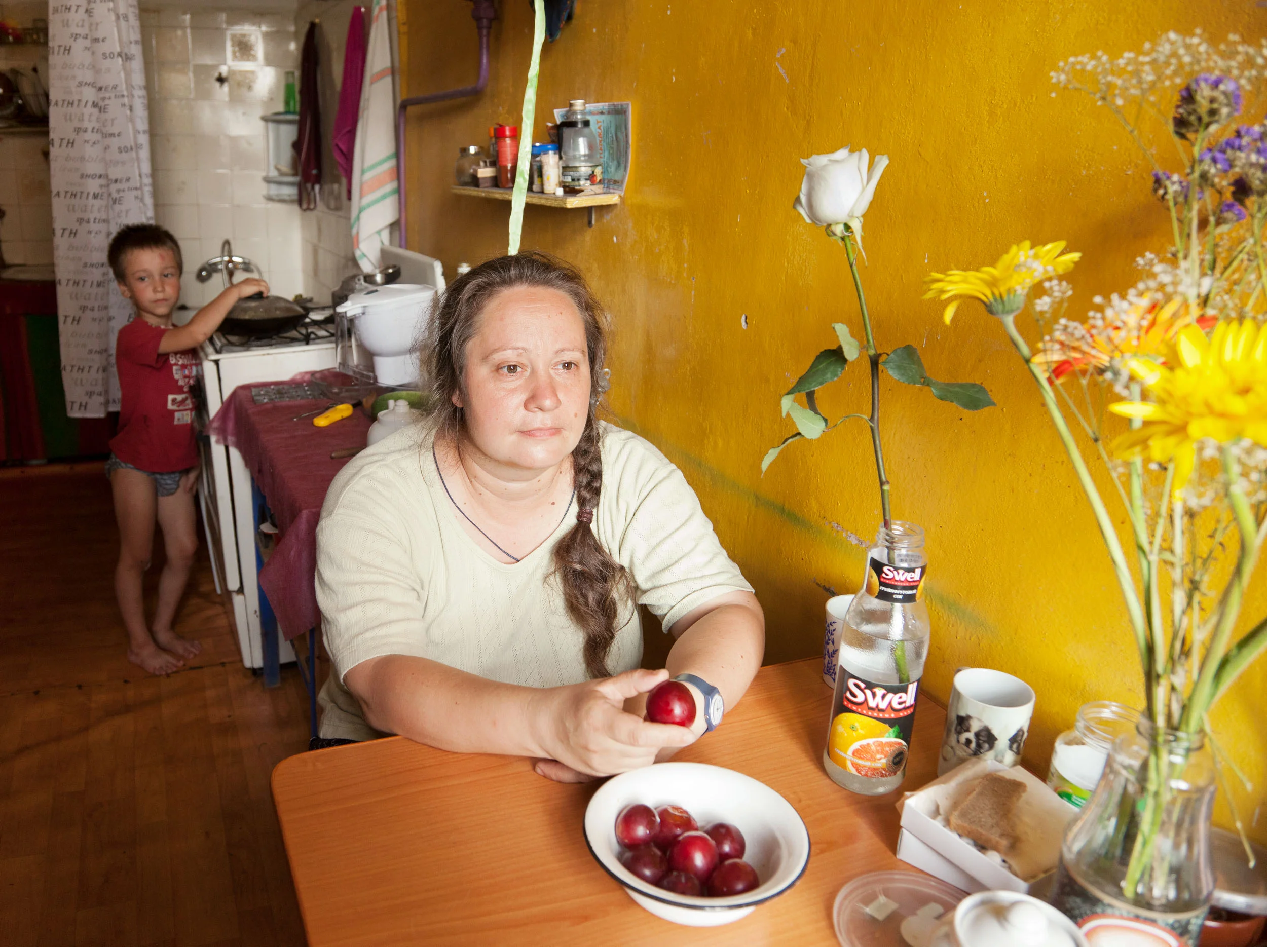 Mother Holding a Plum , from The Russians, 2011