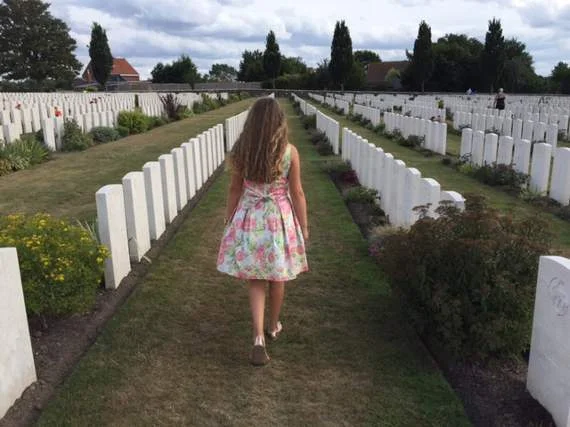Rebecca walking through Tyne Cot in the afternoon after the official ceremony