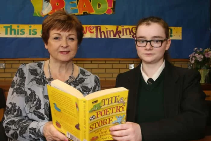 St Patrick's College student Maeve Loney who has won a poetry competition organised by the charity "Never Such Innocence" to commemorate Word War 1. Maeve's poem entitled 'No Poppies in the Sand' has won a trip to London for her and her English teacher Mrs Dempsey.