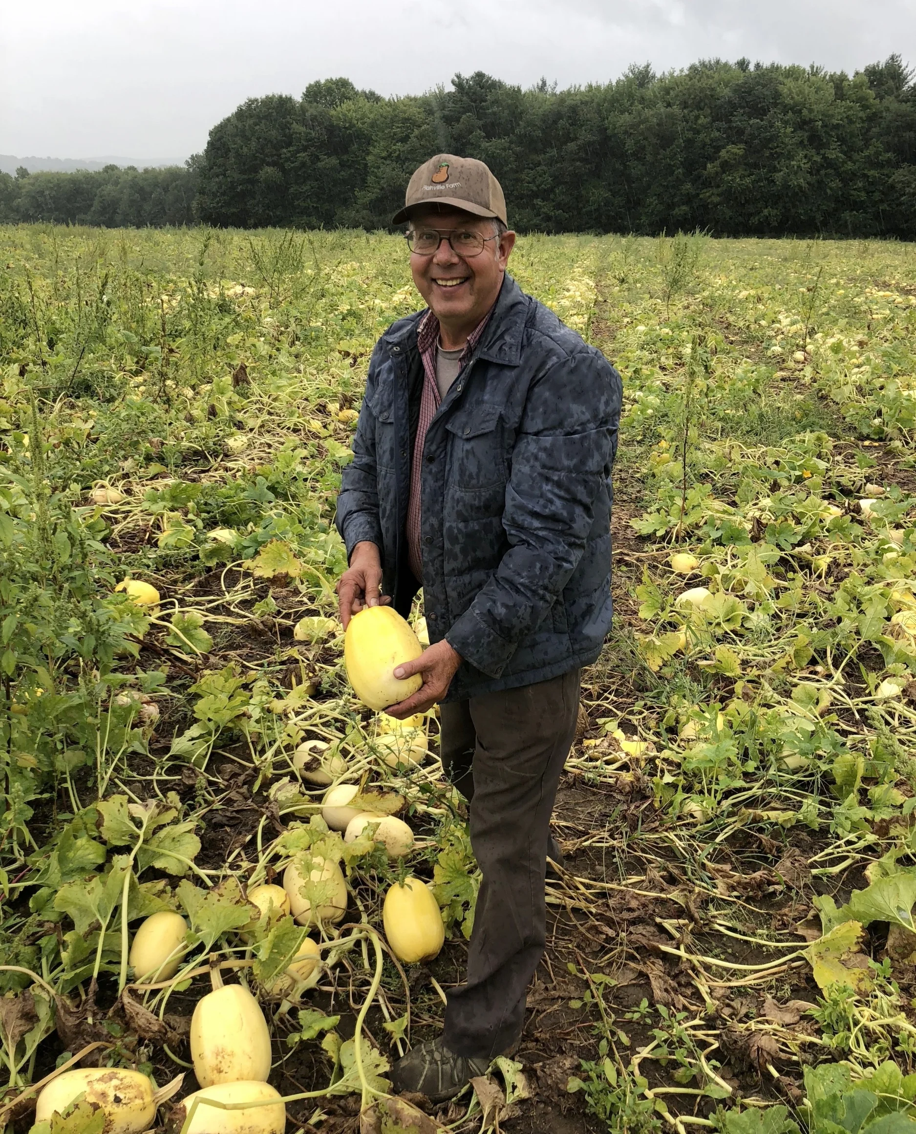 Wally Czajkowski in his field of (delicious!) spaghetti squash.