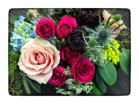 Our Fall Wooden Flower Box with deep reds, blues and pink highlights!