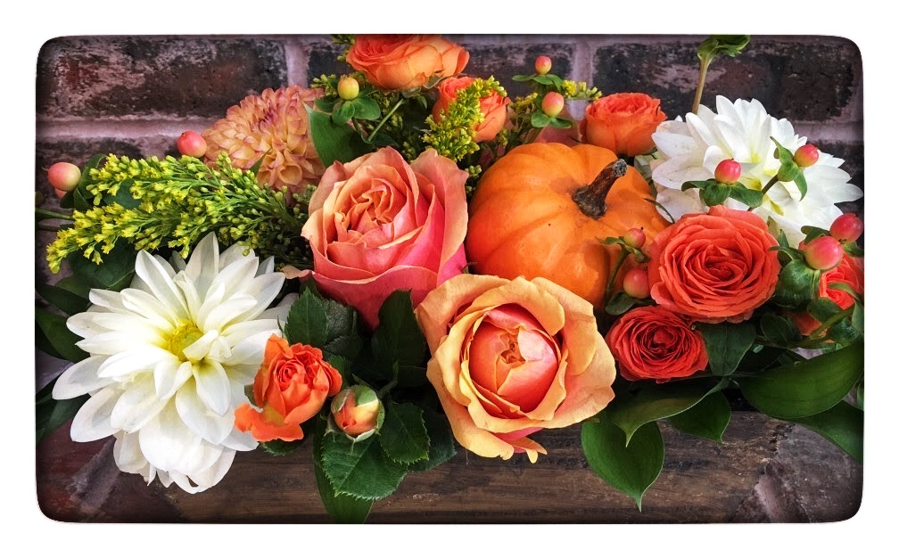 Our Pumpkin Wooden Flower Box with shades of orange, white and yellow plus a baby pumpkin!