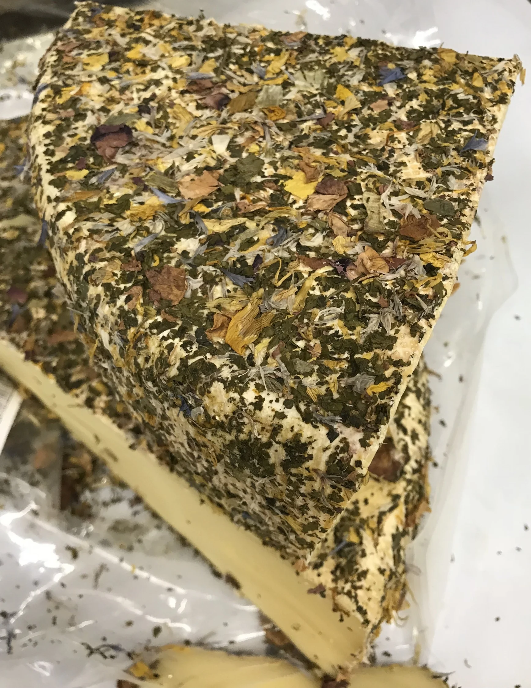 Gorgeous and delicious Hay Flower cheese available now at Russo’s!