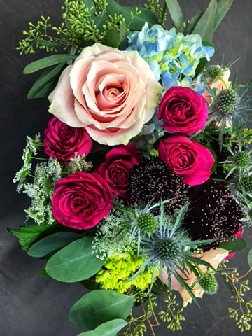 Our florists create custom-made arrangements and bouquets for individuals, groups and weddings.