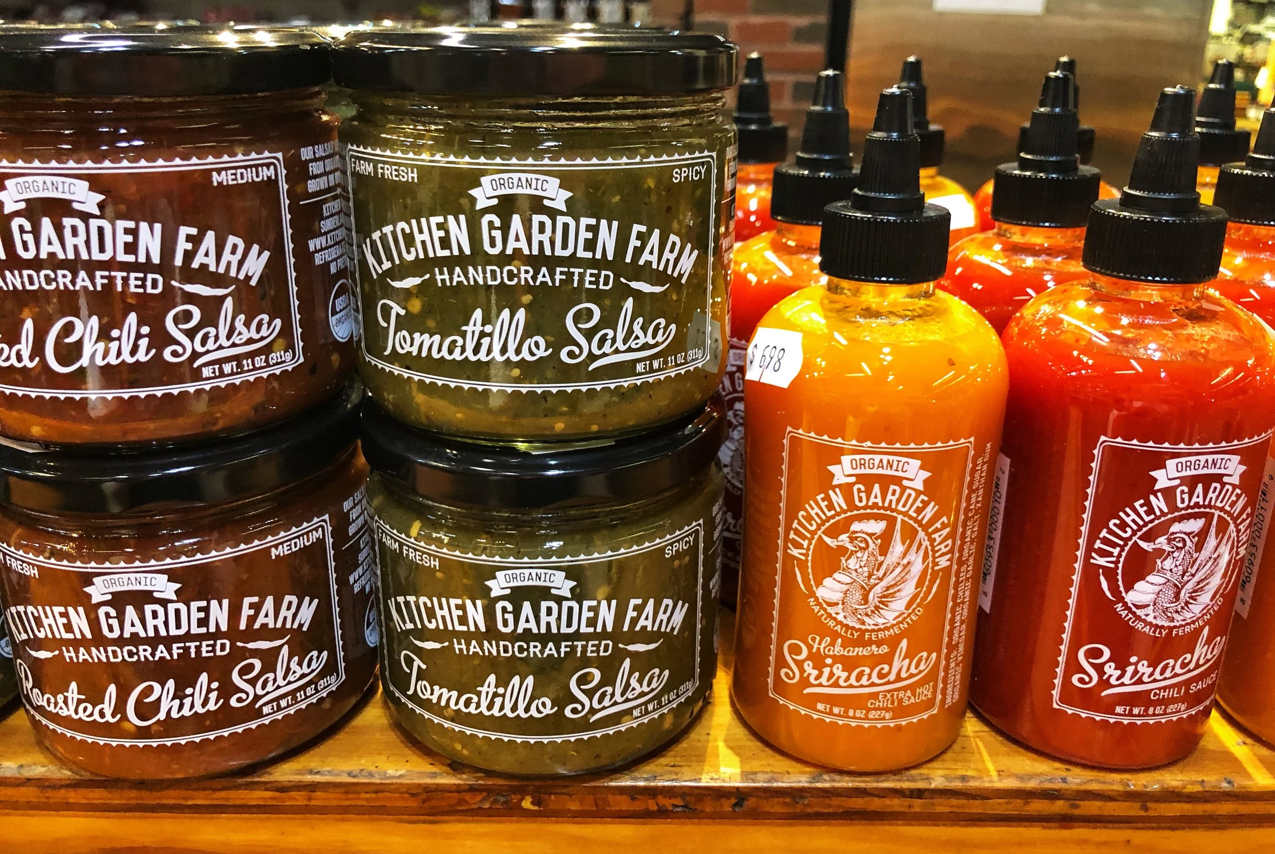 Kitchen Garden Farm’s delicious organic handcrafted Salsas and Srirachas at Russo’s.