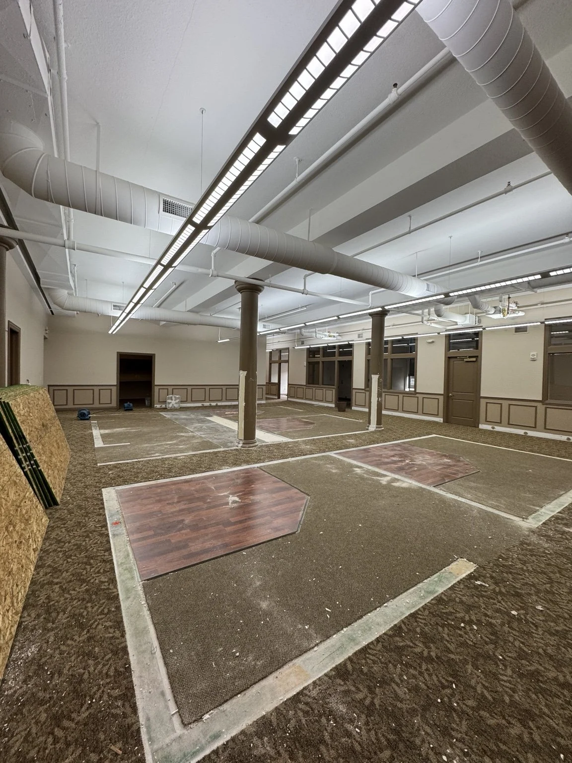 Cleared interior space being prepared for ballet studio construction