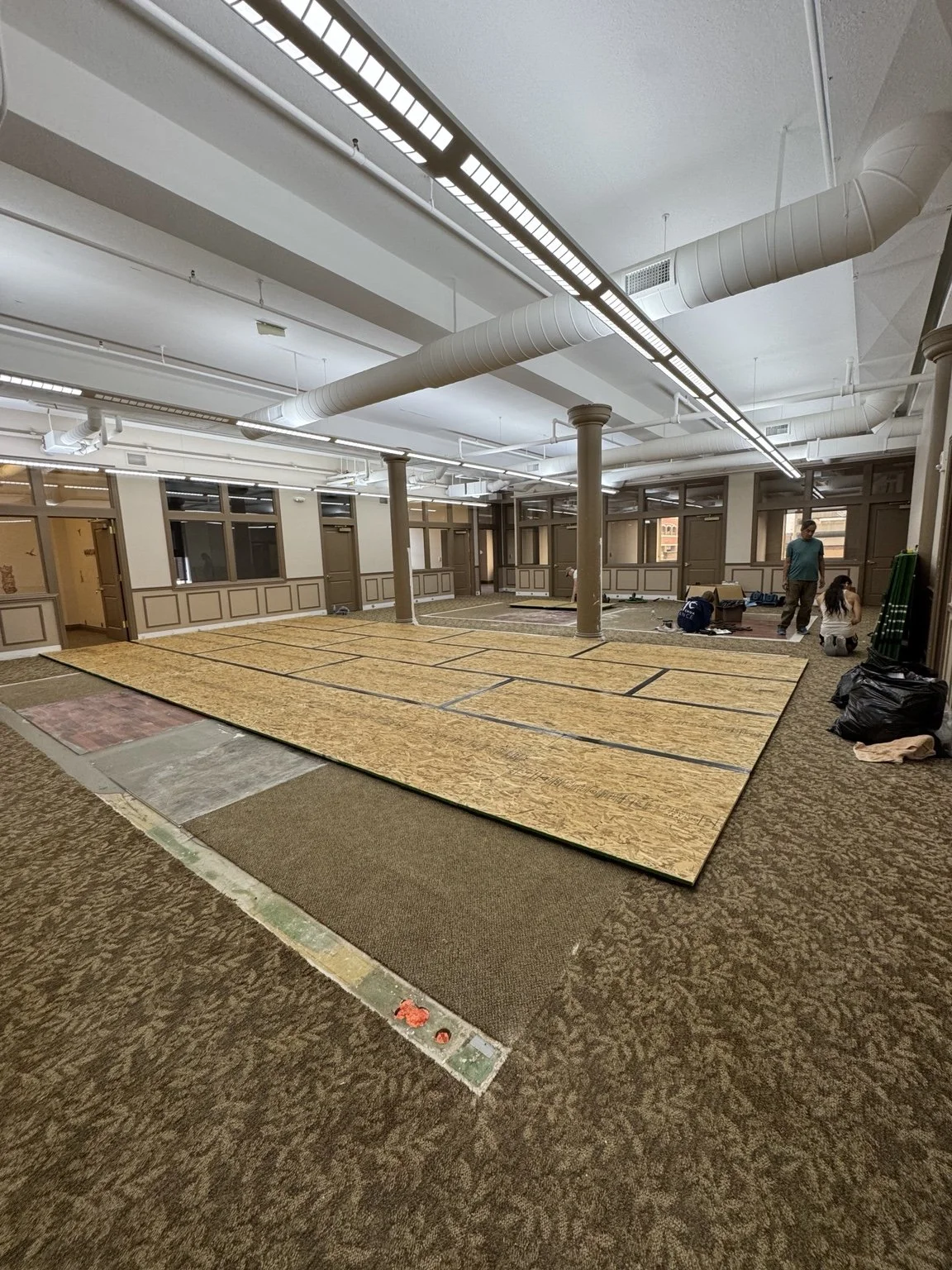 Sprung dance floor system being constructed in the future Kalamazoo Ballet studio