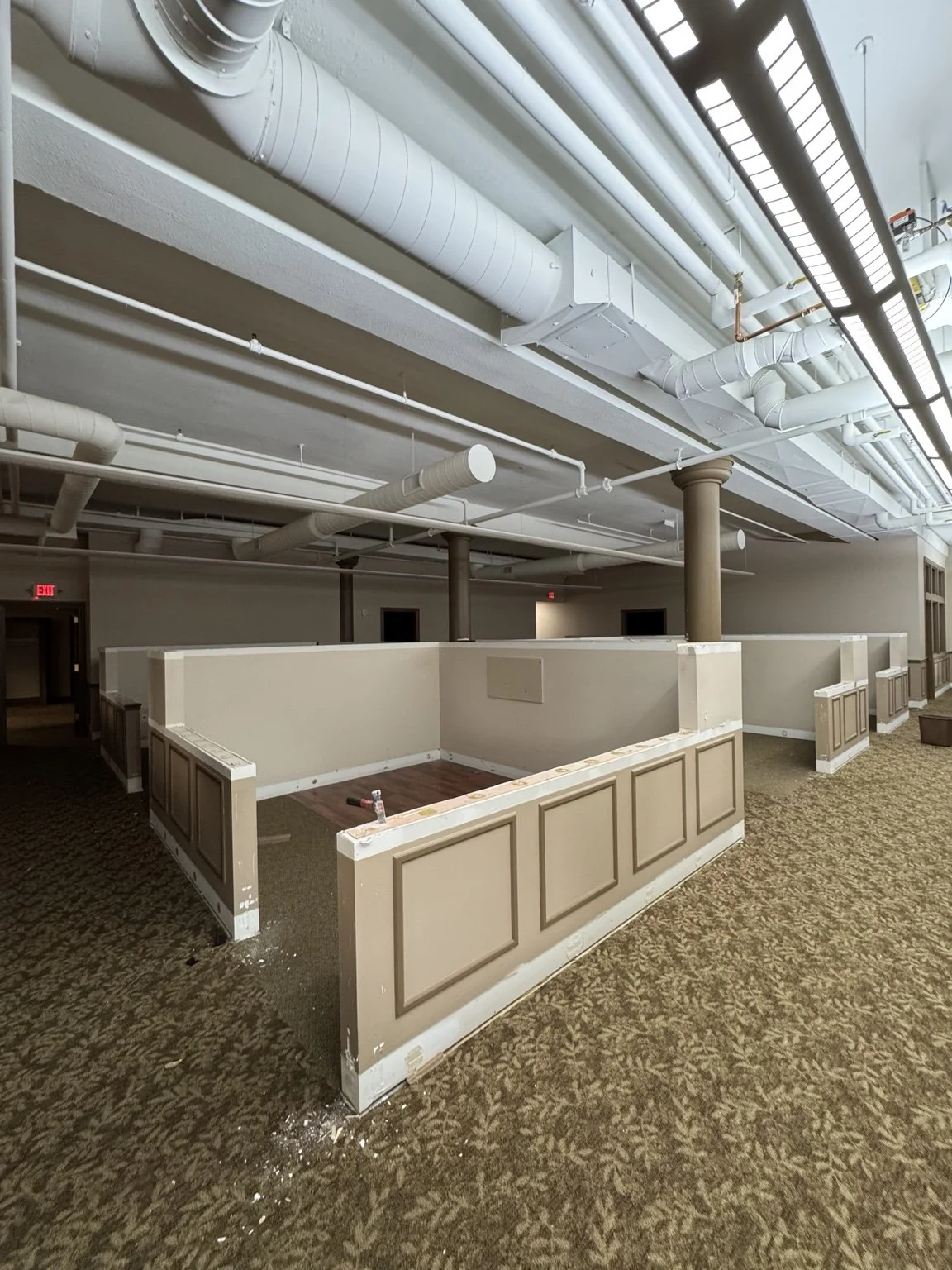 Existing commercial interior before Kalamazoo Ballet studio construction