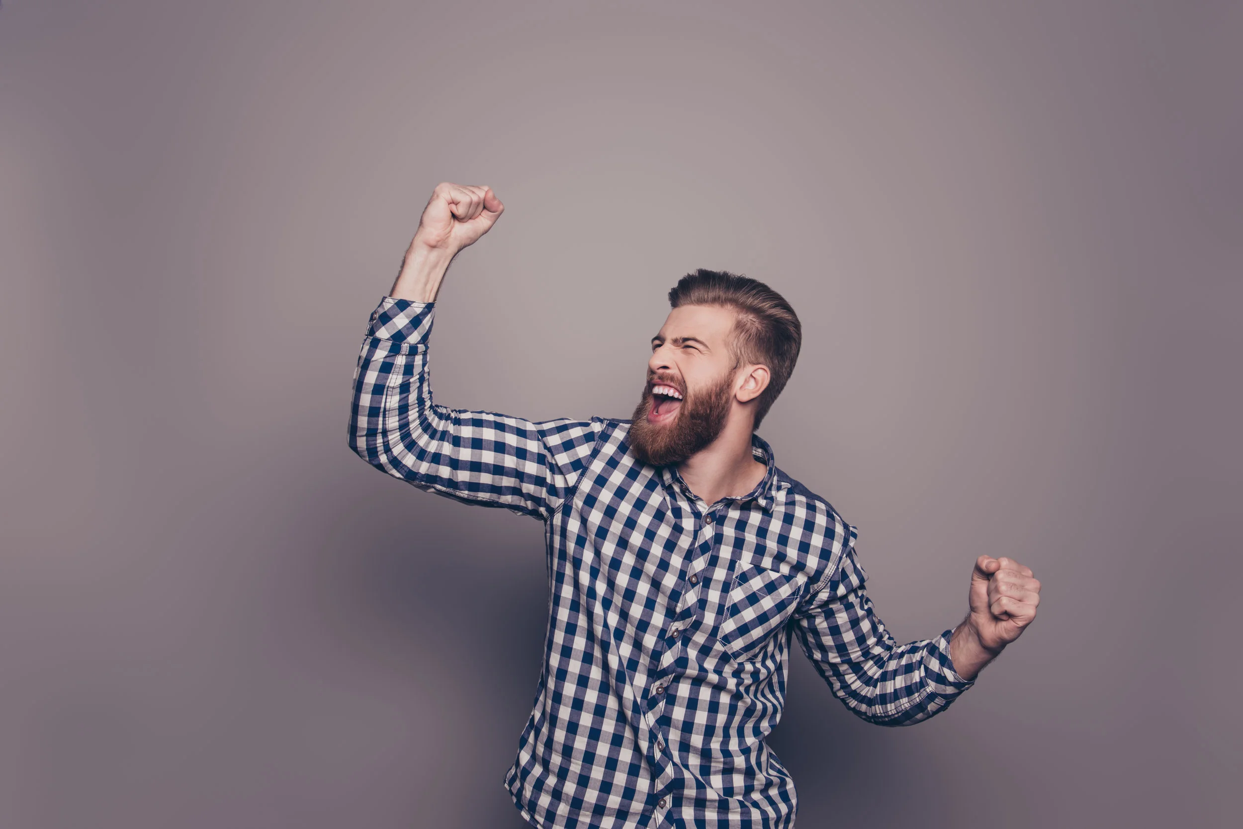 Yes,-he-did-it!--happy-bearded-man-raised-hands-636831346_7360x4912.jpeg